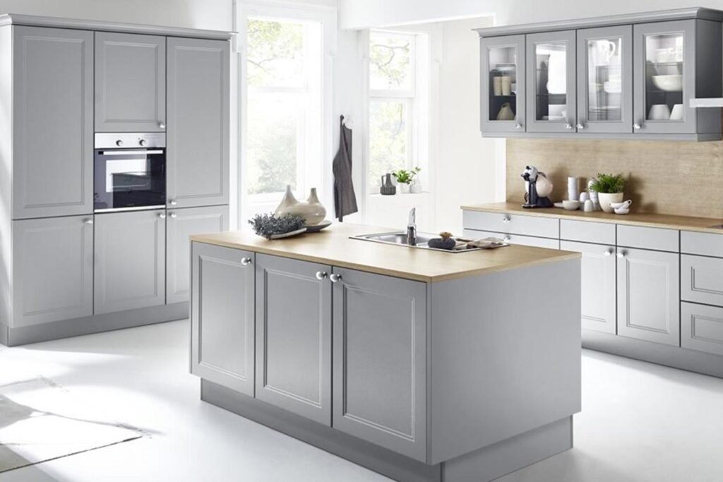 A grey kitchen island with a touch of nature 1 1 Nolte Brasov
